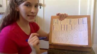 Vertical Lines in Capital Letters Highlighting to Improve Handwriting
