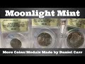 Moonlight mint  more coinsmedals made by daniel carr
