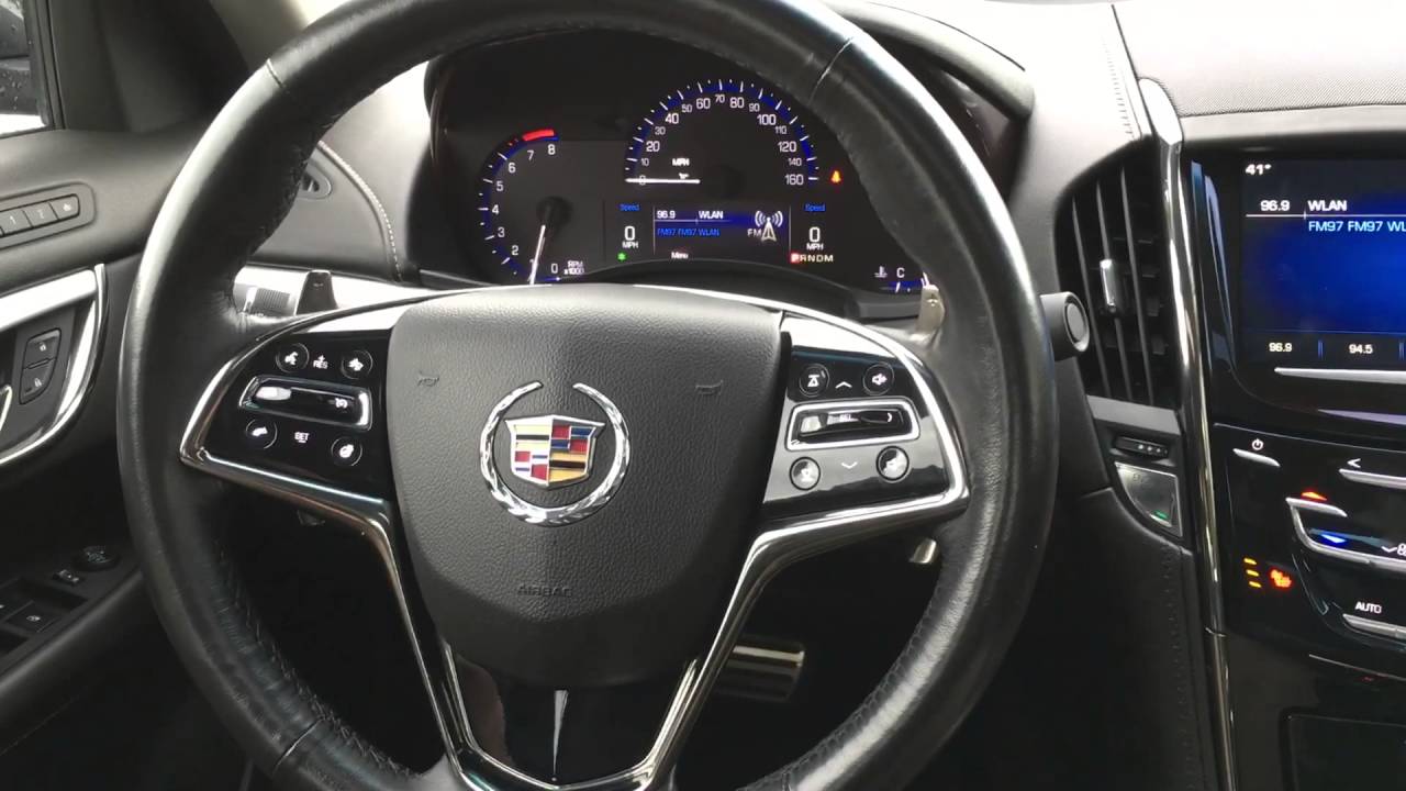 How do use the heated steering wheel feature on a 2014 Cadillac ATS