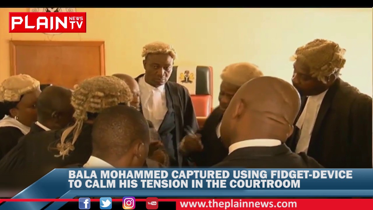 Former Minister Bala Mohammed caught using fidget-device....