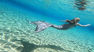 SILVER MERMAID SWIMMING IN CRYSTAL CLEAR FLORIDA SPRINGS