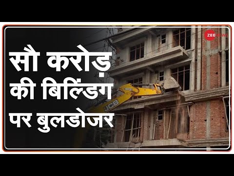 Bulldozer on former MP's building in Lucknow