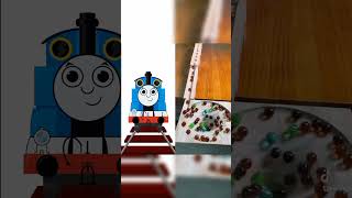 Thomas Watched The Marbles Spin