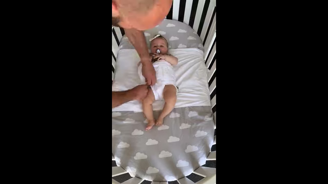 How to put the Safe T Sleep Sleepwrap baby wrap on a cot crib