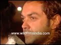 Bobby deol and abhay deol pose for shutterbugs at a party