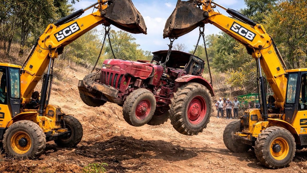 Watch how Jcb 3Dx Expert backhoe pulls Mahindra tractor out of accidental Area