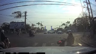 Two Motorbikes Crashing Into Each Other After A Guy Ignored The Red Light