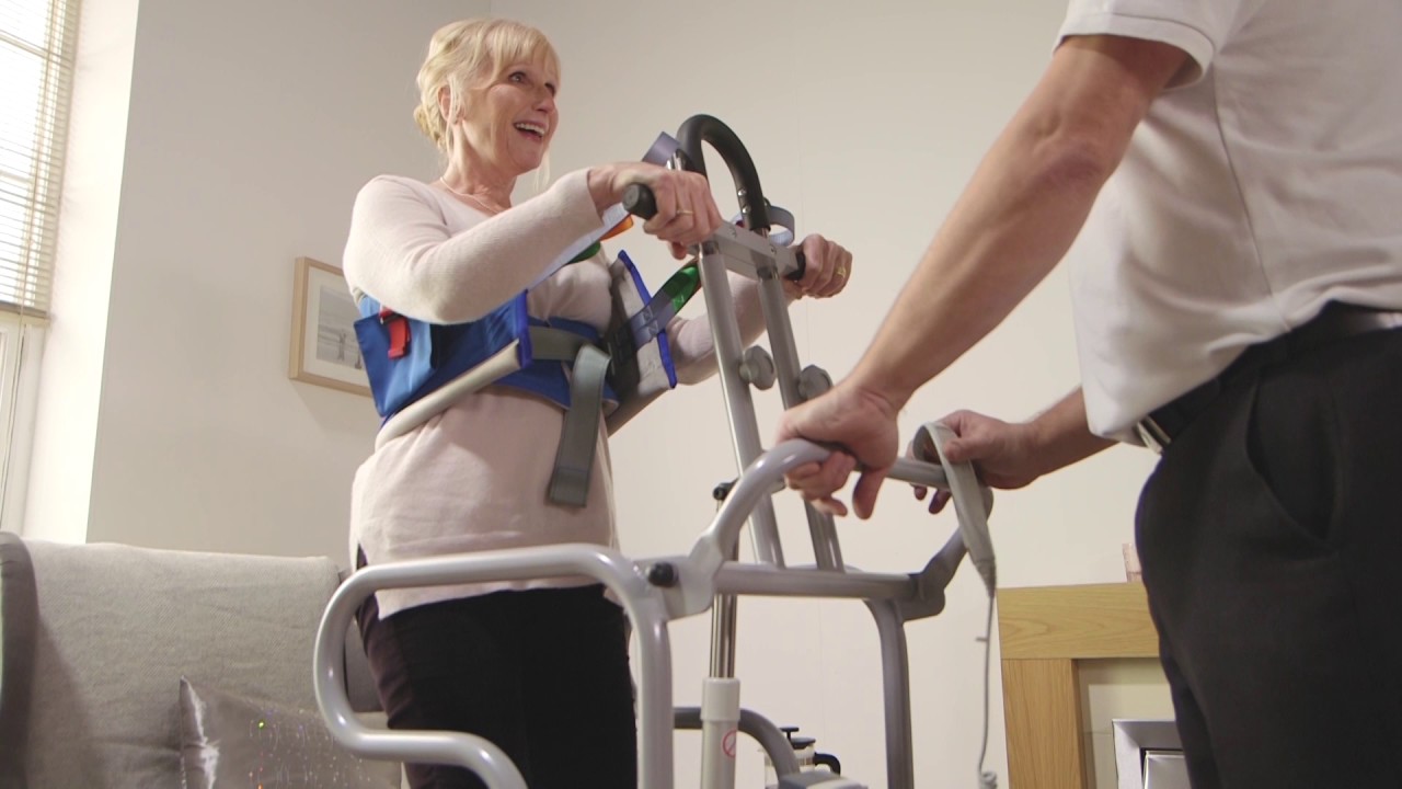 Transferring a person from chair to Showerchair Ft. Stand Aid, Thoracic