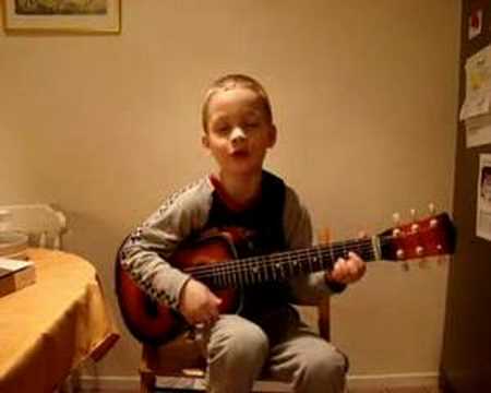 Tim 5 years old playing guitar. - YouTube