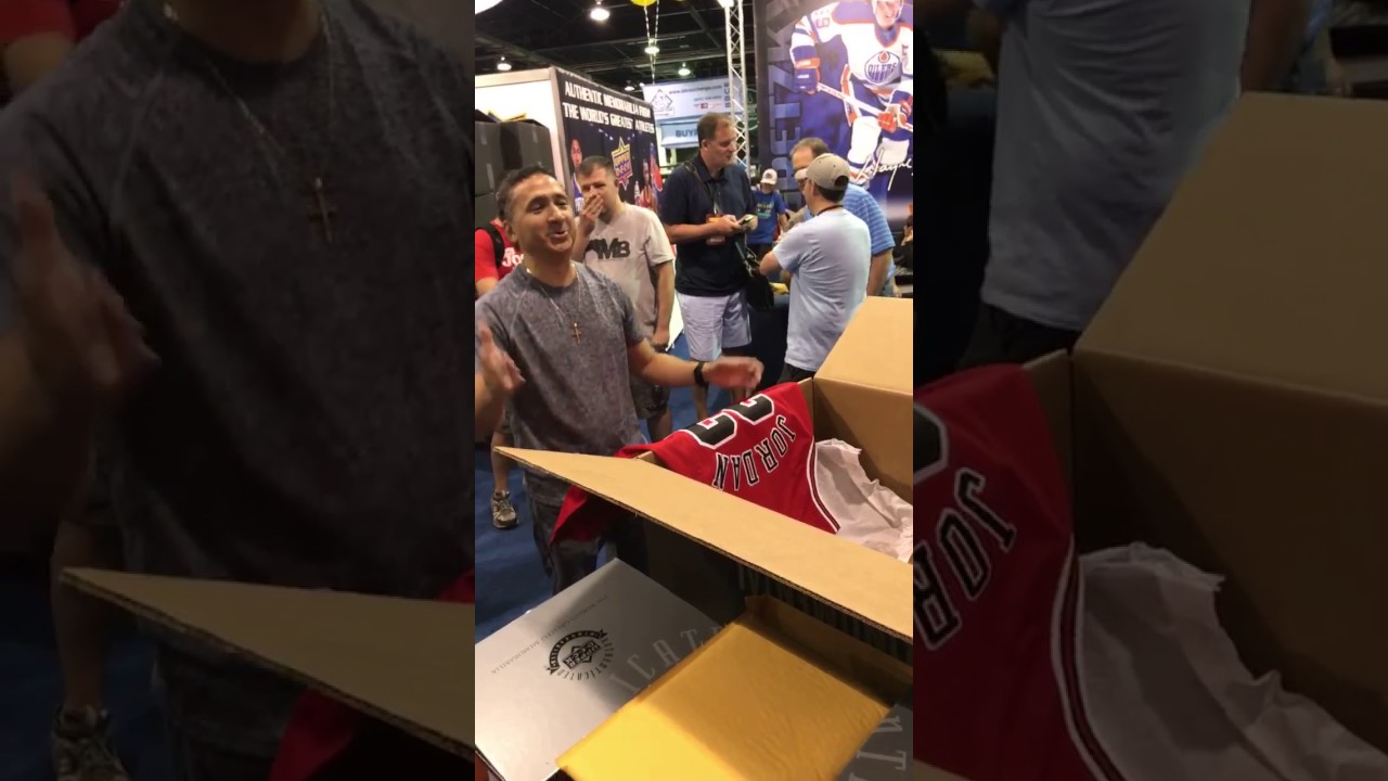 Collector pulls Michael Jordan Autographed Jersey from UDA Monumental