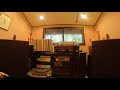 西岡恭蔵「ひまわり村の通り雨」