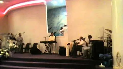 Angelo Morgan getting baptize