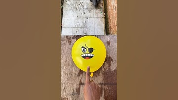 Experiment: Dropping an emoji water balloon from a height, does it explode?