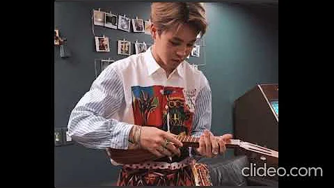 Jimin playing a mandolin but it's a LQ photo seque...