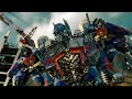 Transformers 3 (2011) Los Wreckers  liberan a Optimus De ser derribado por Shockwave