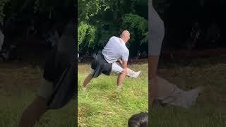 POV Laughing While Cheering for Cheese Rolling Competitor