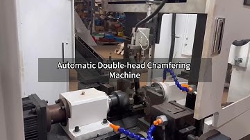Automatic double-head chamfering machine, with catcher-type gripper feeding and Conveyor loading