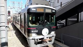 神戸電鉄6000系6002F(Kobe Rail&Trail ヘッドマーク付)　普通 新開地行き　鈴蘭台駅1番線到着　2023年12月1日撮影