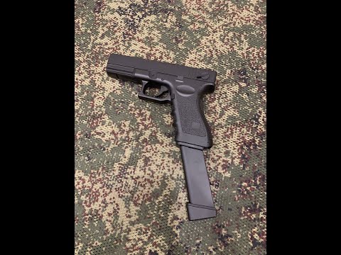 Обзор Cyma Glock 18c CM030