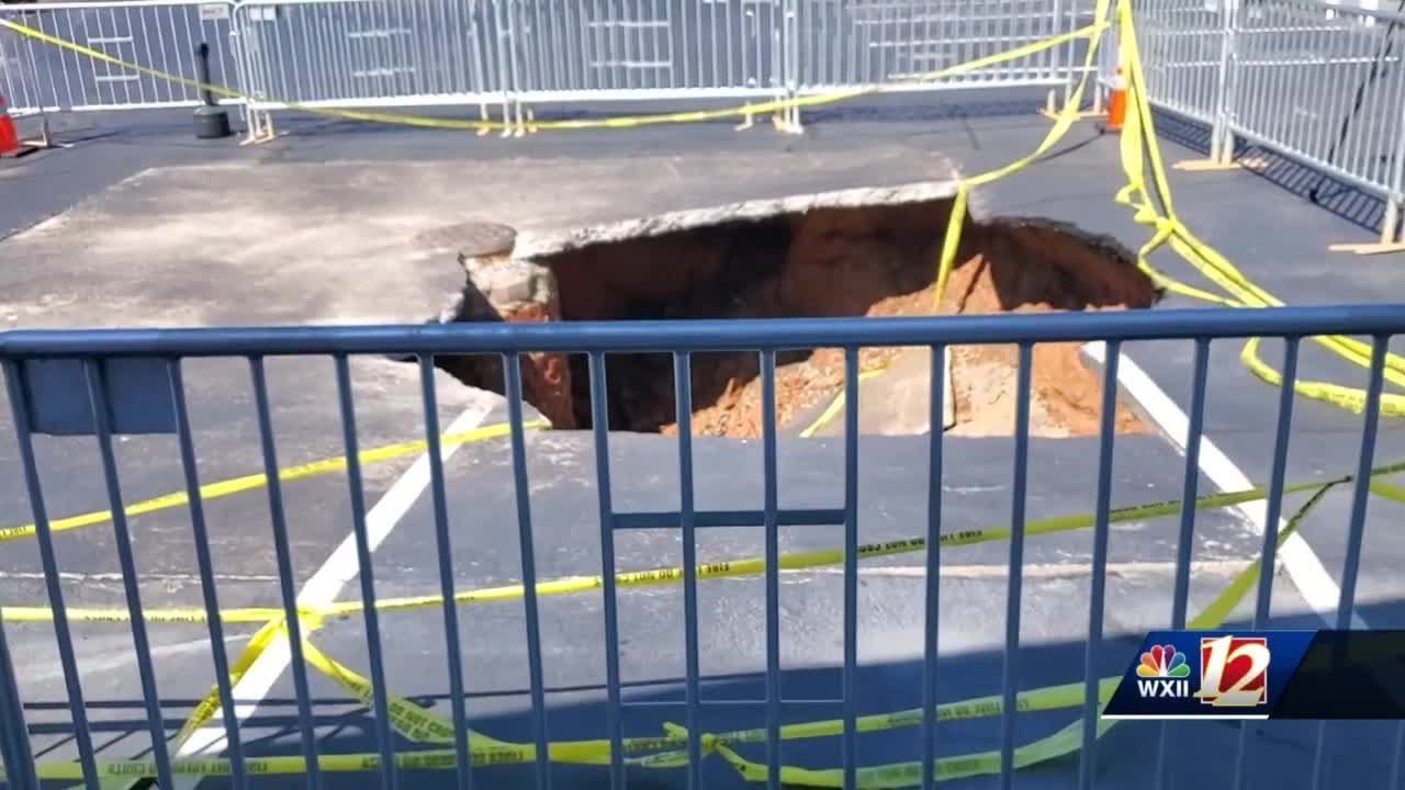 Triad woman falls in sinkhole after ground collapses at Winston