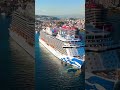 Vertical video. Kusadasi, Turkey. Panoramic of the port during morning arrival of the Majestic Pr...