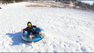 Snow Sledding at Waubonsie Lake Park ,Aurora, Illinois ,USA .