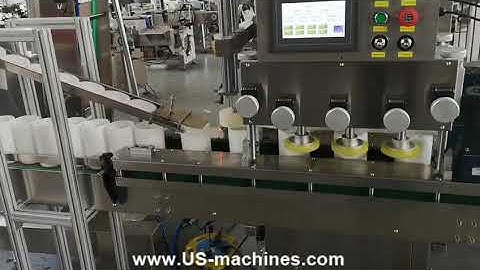 Big bottle cap feeding spindle wheel capping machine testing video