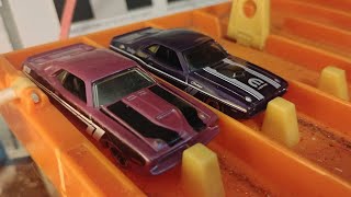 Celebrity 1970s Mopar muscle cars drag race. 1970 Dodge Challenger R/T vs 1970 Plymouth Barracuda AAR Cuda Wealth