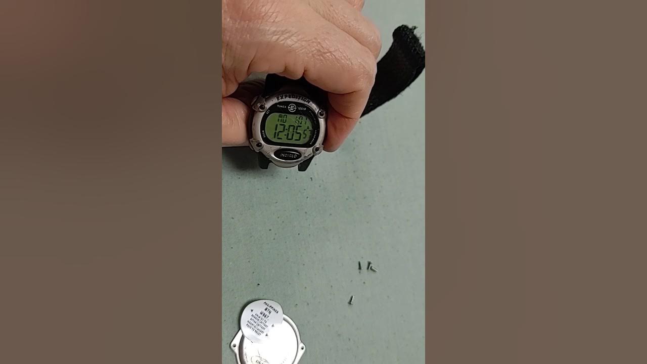 How to remove the battery clip on a Timex Expedition Indiglo watch. YouTube
