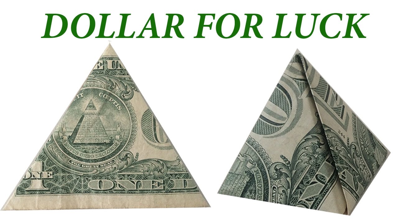 Треугольник из купюры. Сложить доллар треугольником. Сложить доллар треугольником для привлечения денег. Сложить доллар. Купюра сложенная треугольником.