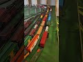 Three HO Gauge trains side by side
