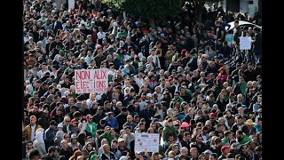 Présidentielle en Algérie : abstention record et manifestations de masse