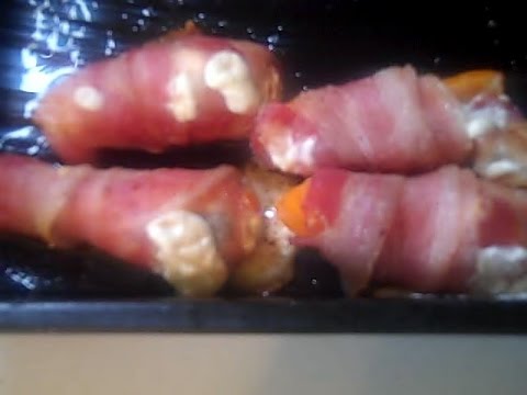 Bacon wrapped cream cheese stuffed peppers
