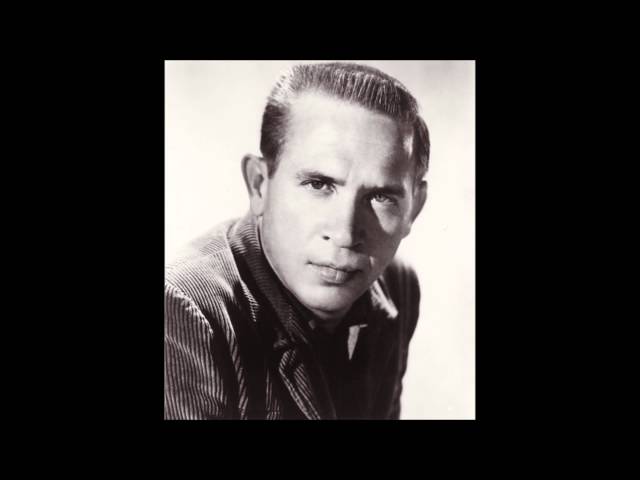 BUCK OWENS - TIGER BY THE TAIL