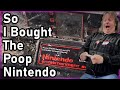 Fixing a rare nintendo covered in   trash to treasure part 2