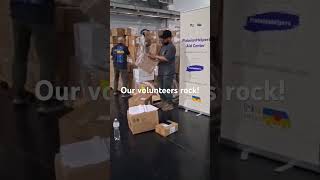UAid Direct volunteers rocking the warehouse!