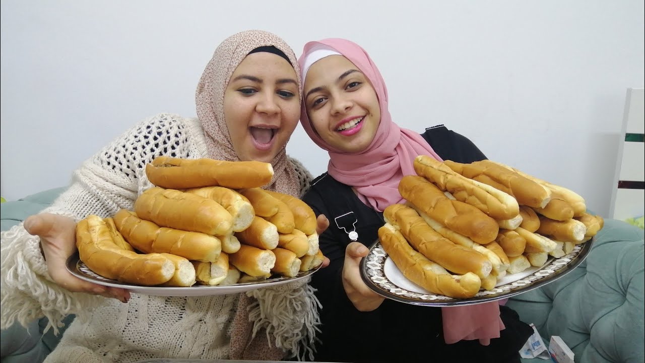 تحدي اكل ٤٠ ساندوتش كبده وسجق 🤣🤣والعقاب بيضه نيه😂😅