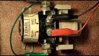 What is a latching relay in an RV battery?