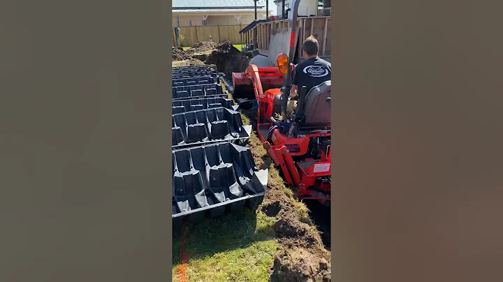 Installing leachfield drain system for septic.