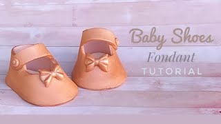 Learn how to make fondant Rose Gold Baby Shoes