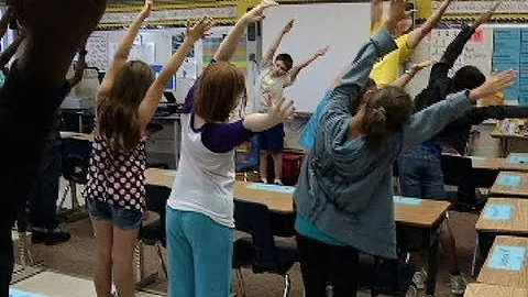 Just breathe. Students practice yoga in classrooms