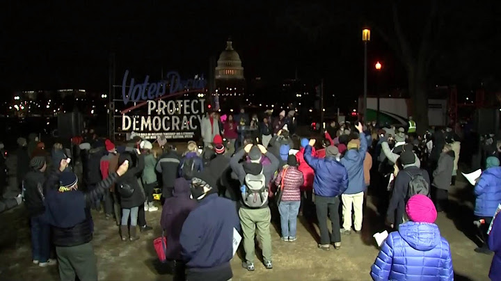 LIVE: President Biden supporters hold candlelight vigil on the anniversary of January 6
