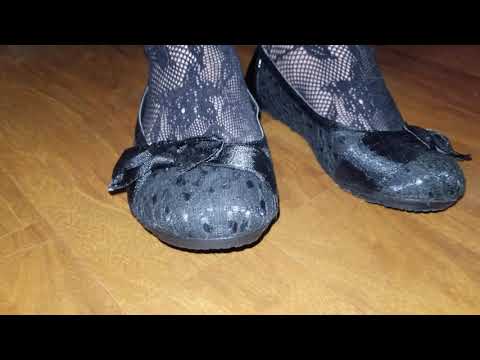 Foot Tapping in Black Tights and Flats