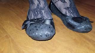 Foot Tapping In Black Tights And Flats
