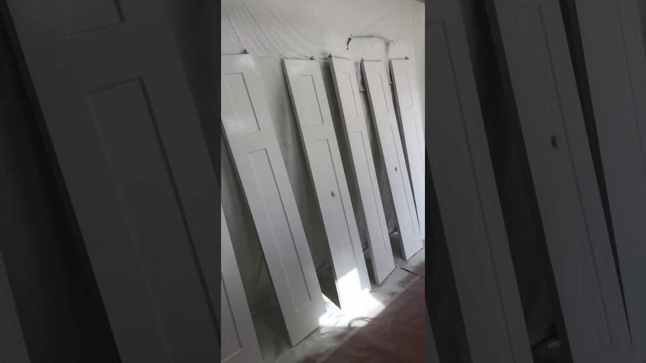 Spray painting 24 total sections of bifold doors YouTube