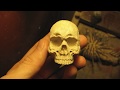 Wooden skull. Pipe tamper. Hand carving.