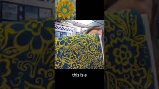 Rachael shows off a teal and yellow batik by Banyan for Northcott