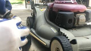How to check and change the oil on Honda HRM 215 Lawnmower