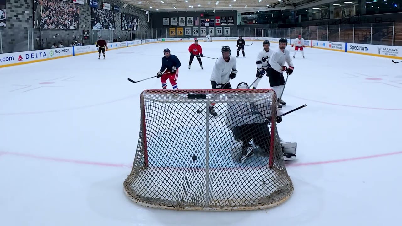 Saunders roofs a backhander for a goal from Scheller