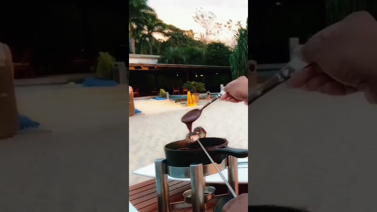 Roasting Marshmellow On The Beach